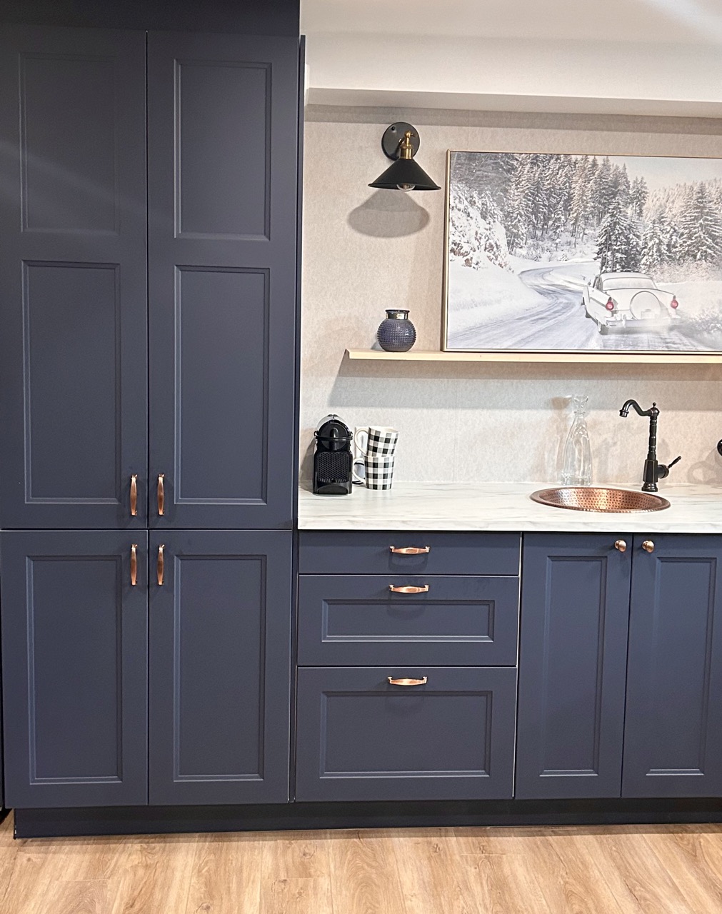 image of navy blue ikea kitchen cabinets in a basement renovation
