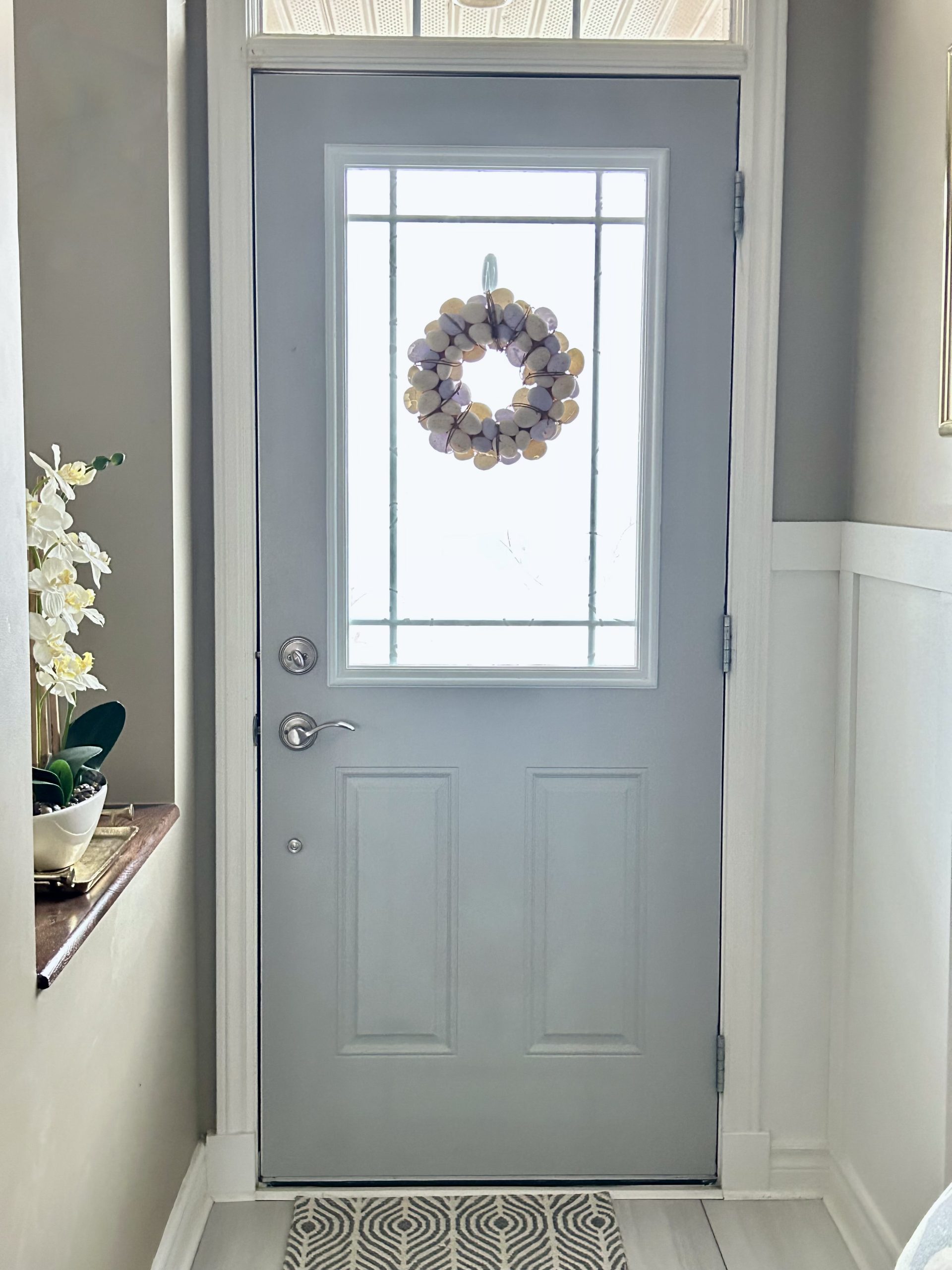 reveal image of interior front door painted pale grey