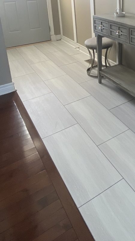 image of new DIY front entryway white floor fully installed
