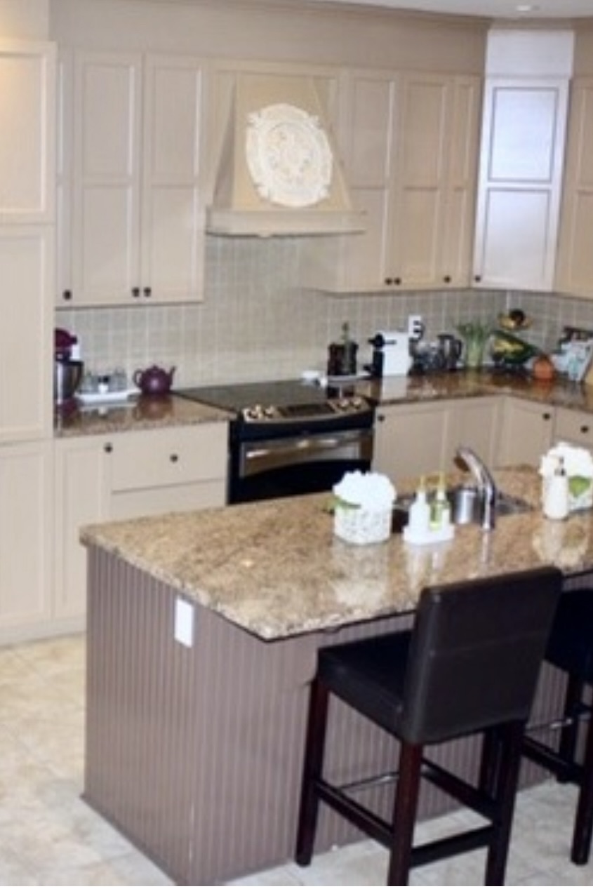 image of caramel coloured kitchen island before reno