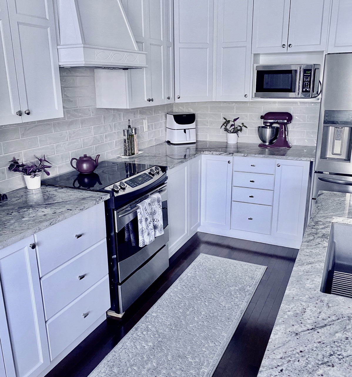 image of kitchen cabinet makeover with white paint